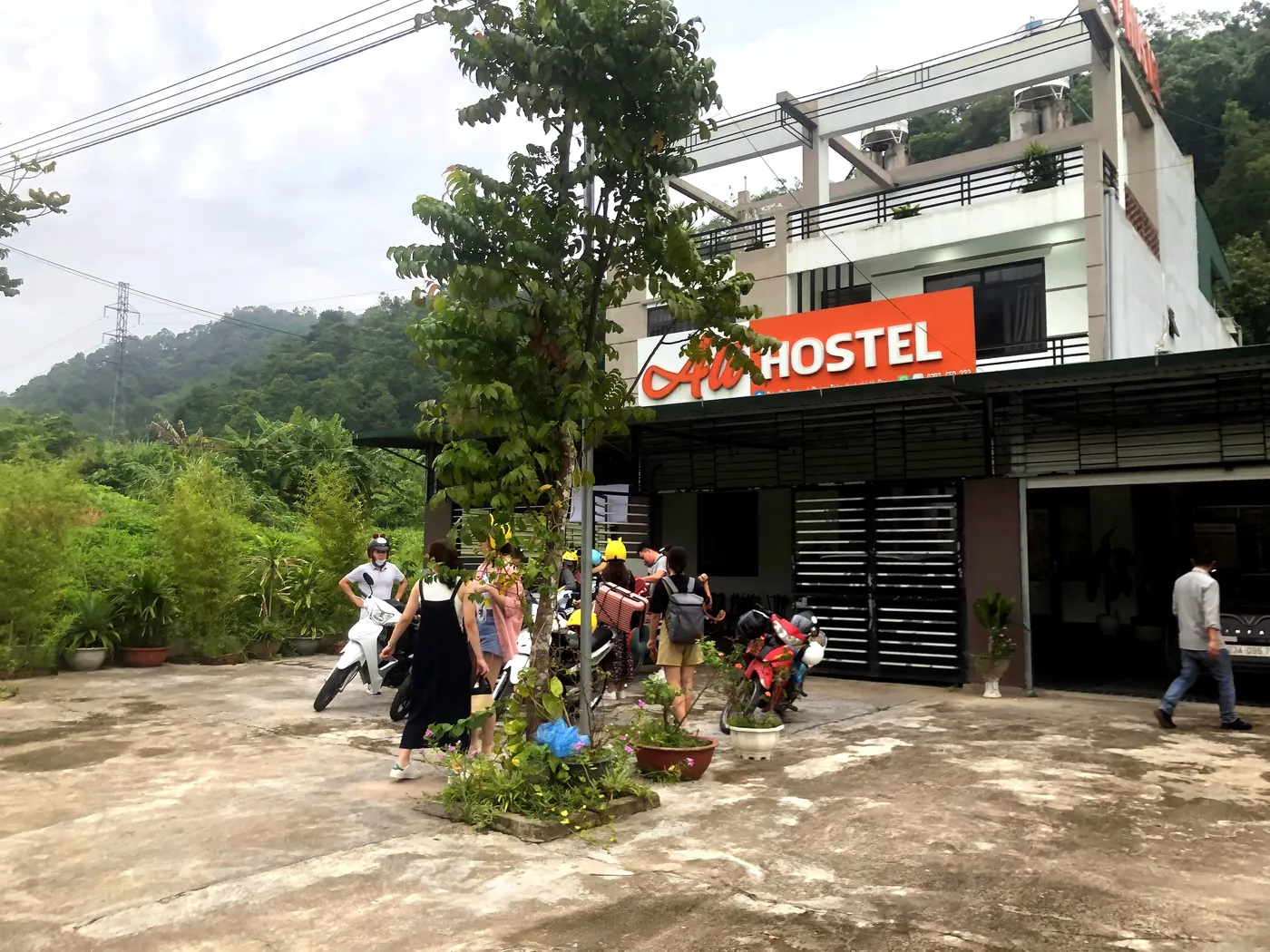 Guests gathering in front of Ali Hostel before departure