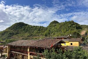 Lo Lo Chai Village with golden-tiled earthen houses below Lung Cu Flag Tower, Ha Giang
