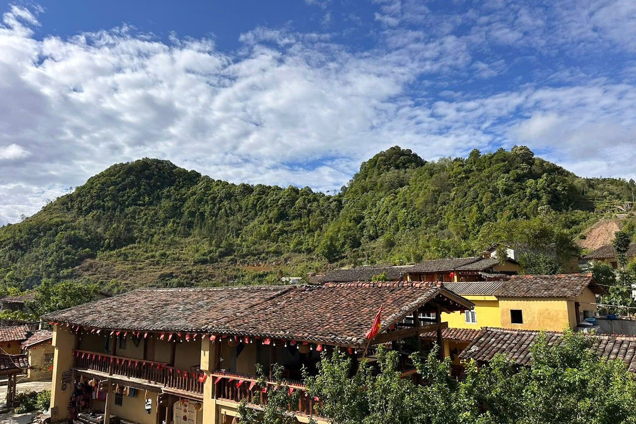 Lo Lo Chai Village with golden-tiled earthen houses below Lung Cu Flag Tower, Ha Giang