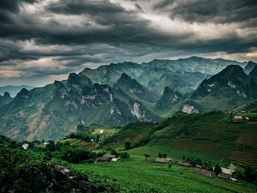 Du Gia Waterfall: A Complete Guide to Ha Giang's Best Swimming Spot 2 Limestone peaks and terraced fields above the Du Gia valley near Du Gia Waterfall