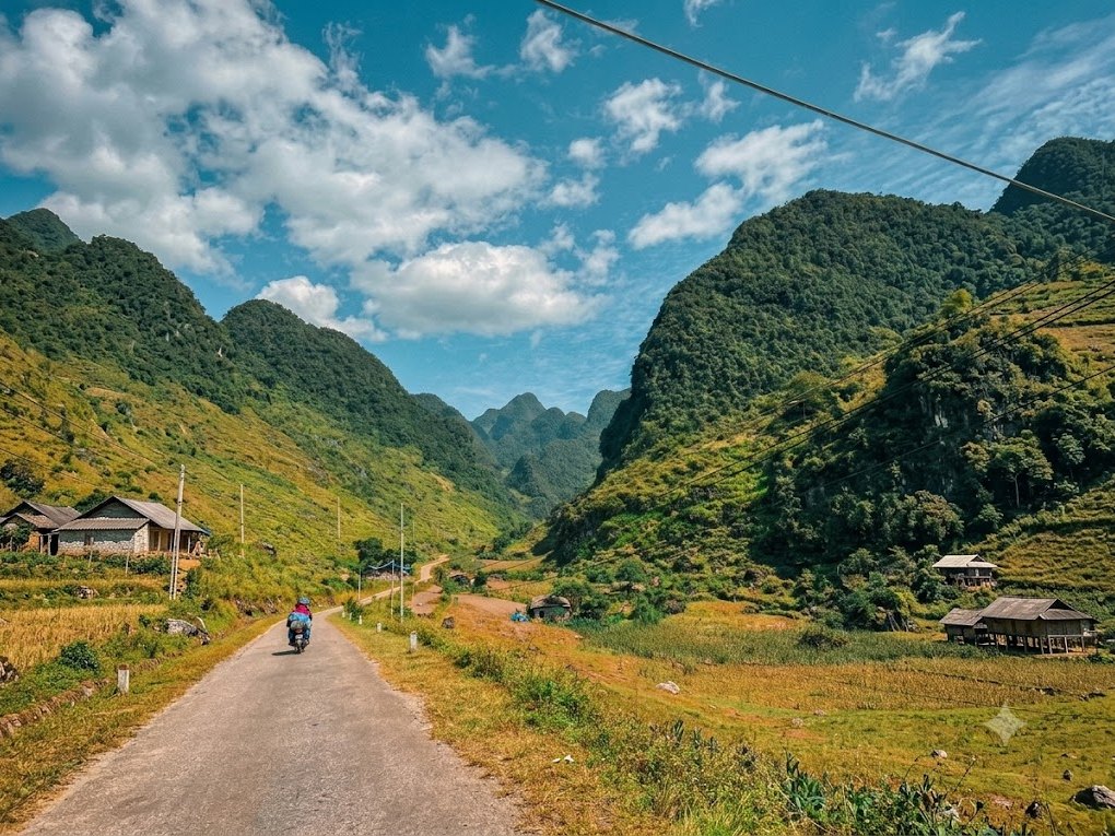 Du Gia Waterfall: A Complete Guide to Ha Giang's Best Swimming Spot 3 A motorbike on the village road into Du Gia on the way to Du Gia Waterfall