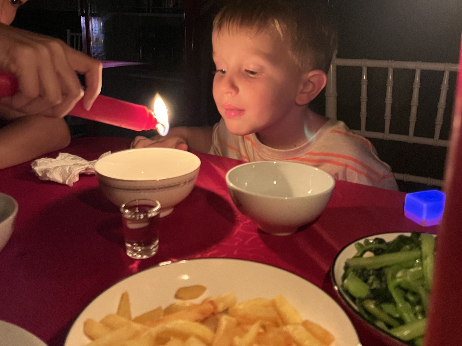 Ha Giang Loop with kids: a birthday candle at dinner during the tour