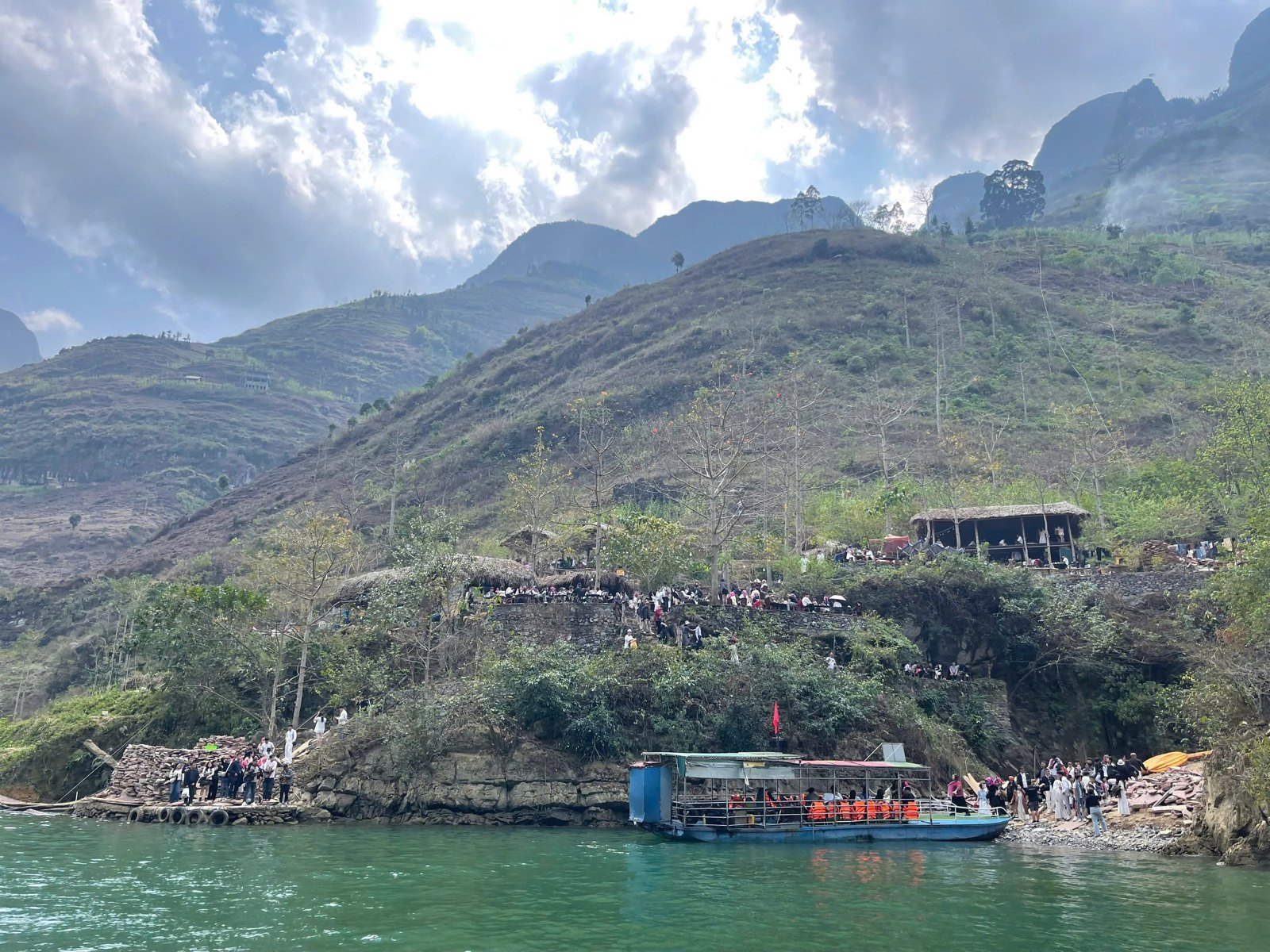 Visitors queuing at the Nho Que River boat pier on the Ha Giang Loop