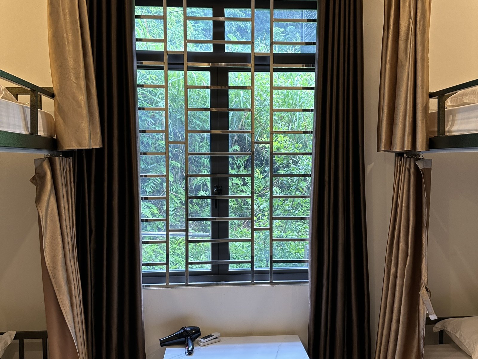 Ha Giang Loop Luggage: Where to Leave Your Big Bag and What to Carry (2026) 5 Free dorm bed at Ali Hostel the night before a Ha Giang Loop tour