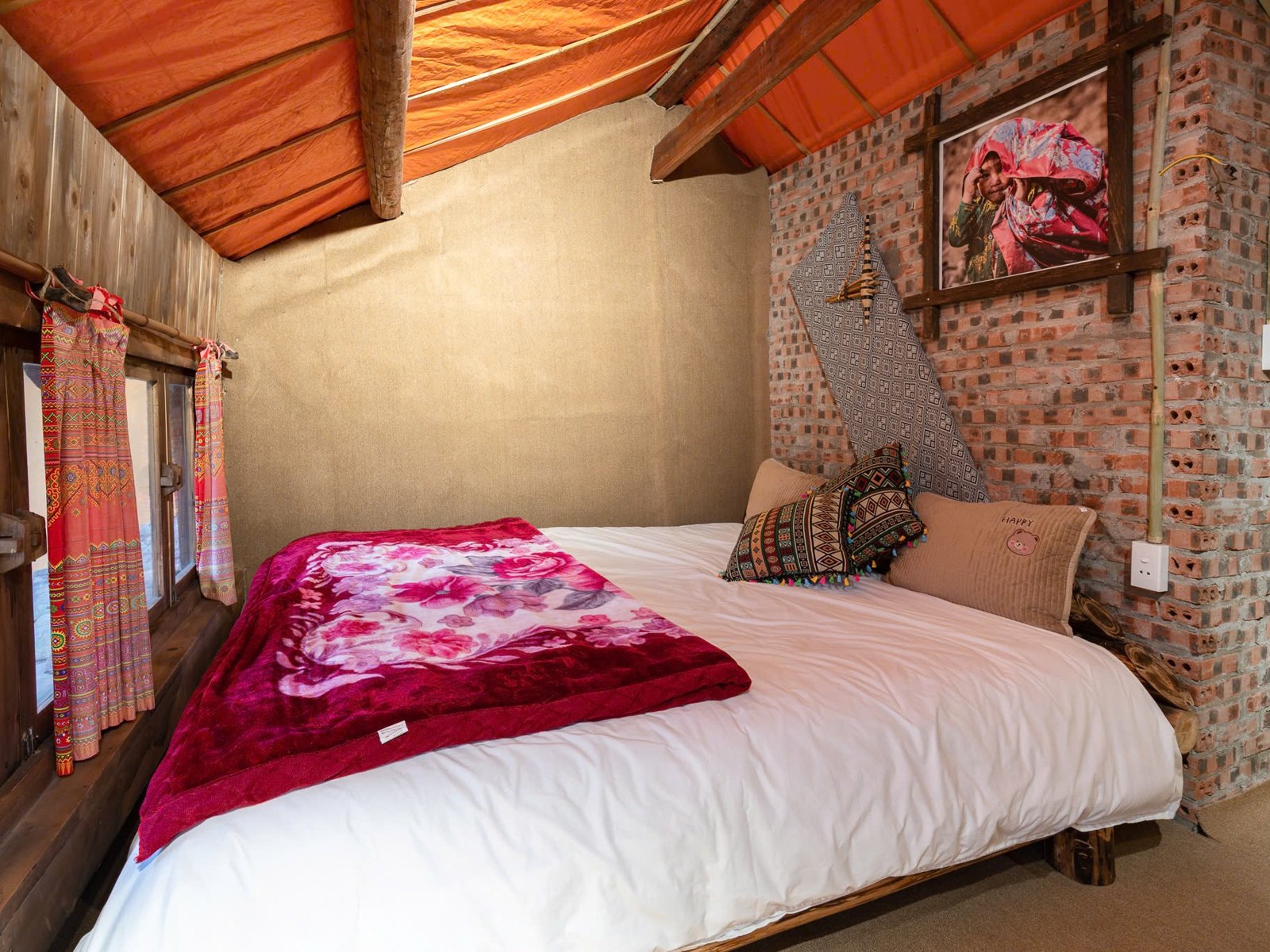 Private en-suite room at a stone homestay in Lao Xa village on a Ha Giang Loop private tour
