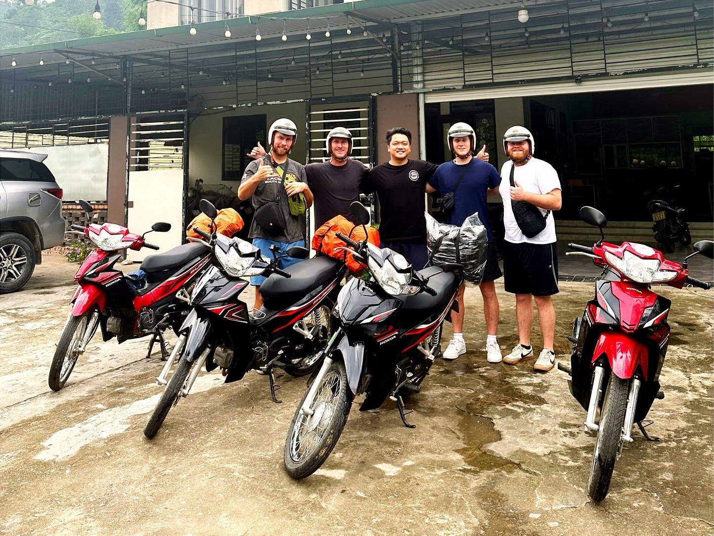 A Ha Giang Loop group tour ready to leave Ali Hostel on motorbikes