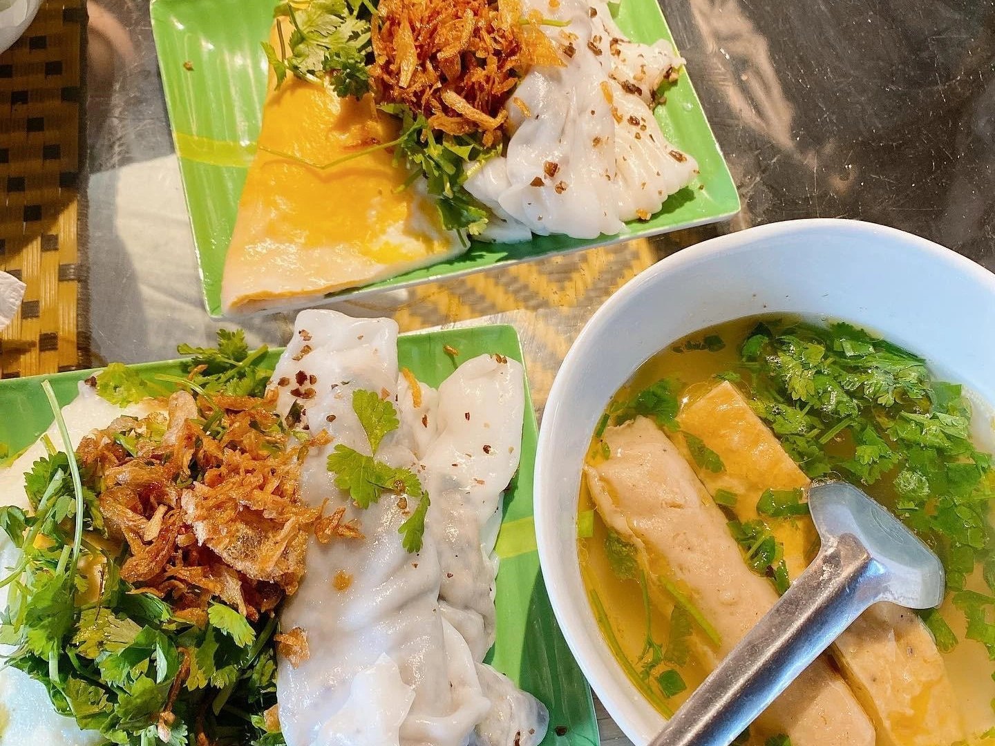 Rice rolls with crispy shallots and herbs, a Ha Giang Loop vegetarian friendly dish