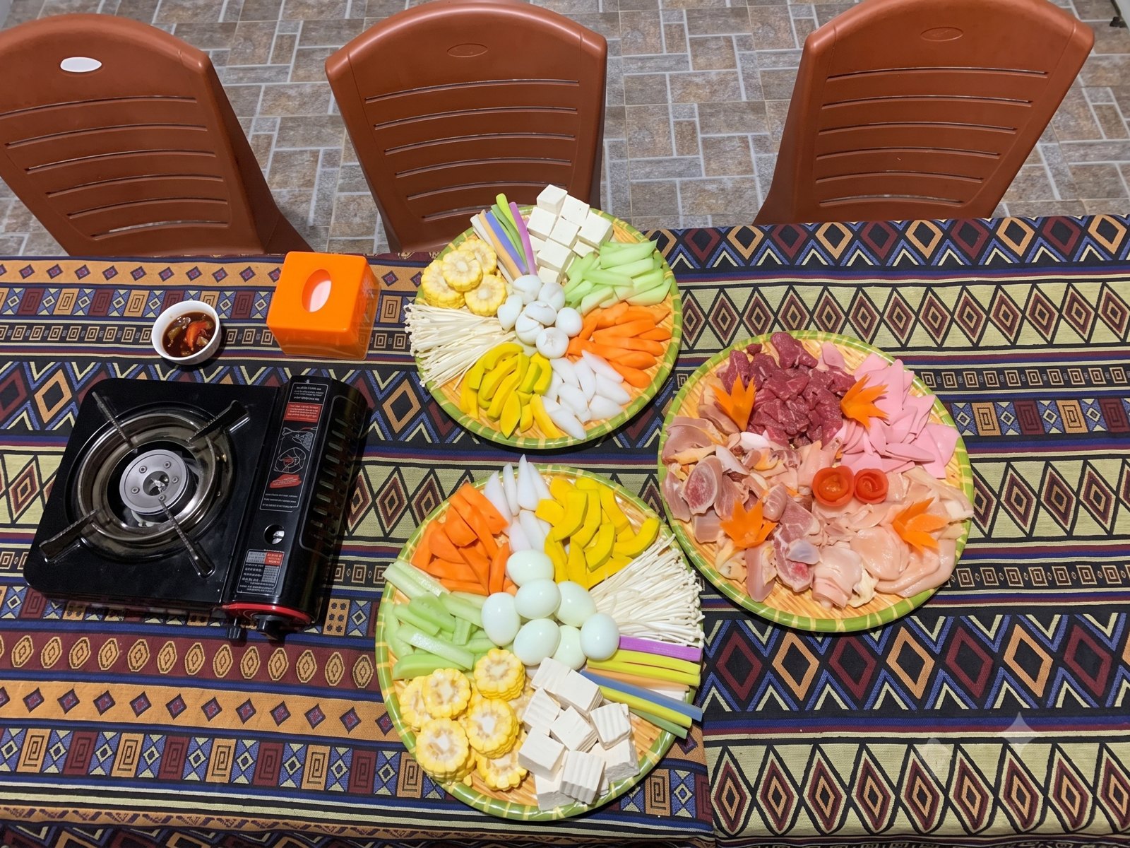 Hotpot dinner at a Dong Van homestay with vegetable and tofu platters
