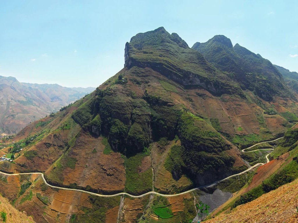 Ma Pi Leng peak with the road cut into the cliff, the highlight of a Ha Giang Loop trip