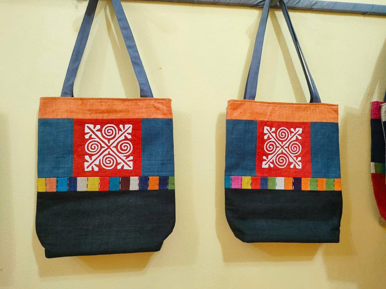 Indigo-dyed hemp tote bags with Hmong patterns from Lung Tam