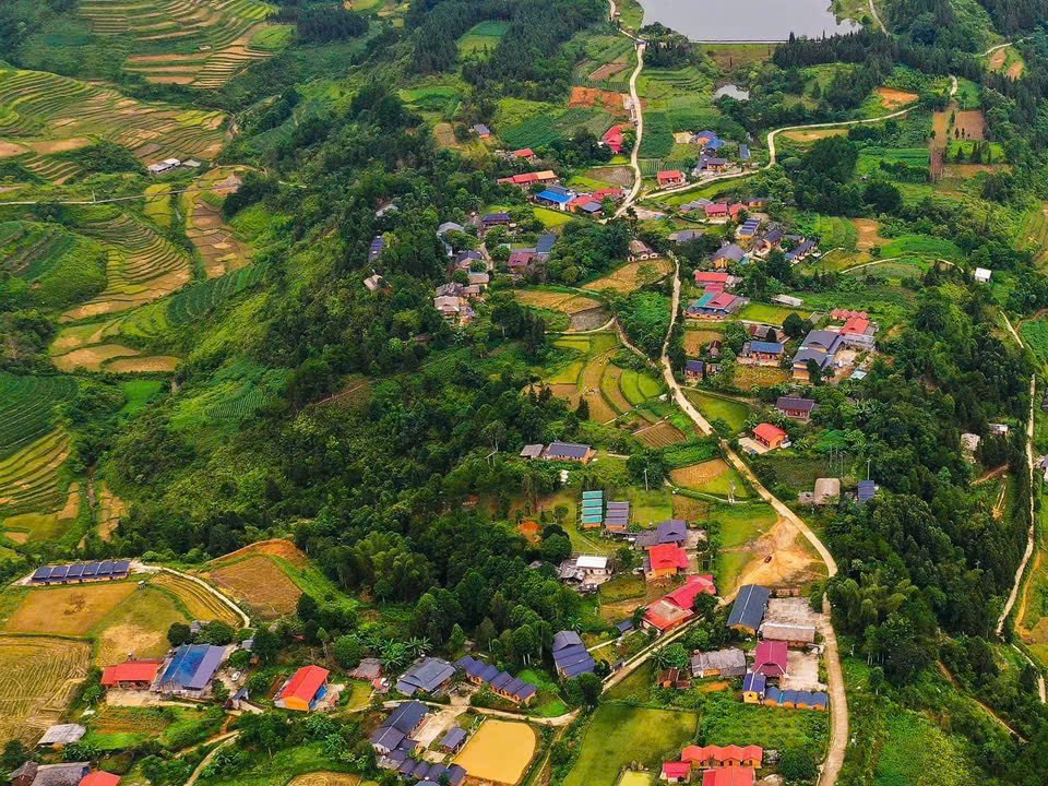 Nam Dam Village: The Dao Homestay Night Most Ha Giang Loop Riders Miss 2 Nam Dam village from above: Dao earthen houses between rice terraces and forest, Ha Giang
