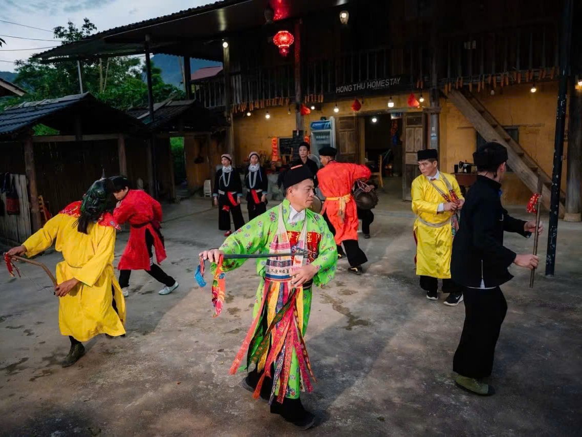 Nam Dam Village: The Dao Homestay Night Most Ha Giang Loop Riders Miss 6 Dao folk dance performance for visitors in Nam Dam village, Ha Giang