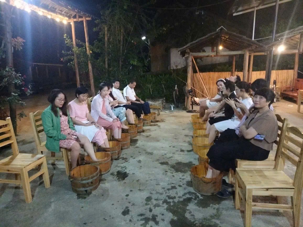 Nam Dam Village: The Dao Homestay Night Most Ha Giang Loop Riders Miss 5 Dao herbal foot bath for guests at a Nam Dam village homestay, Ha Giang
